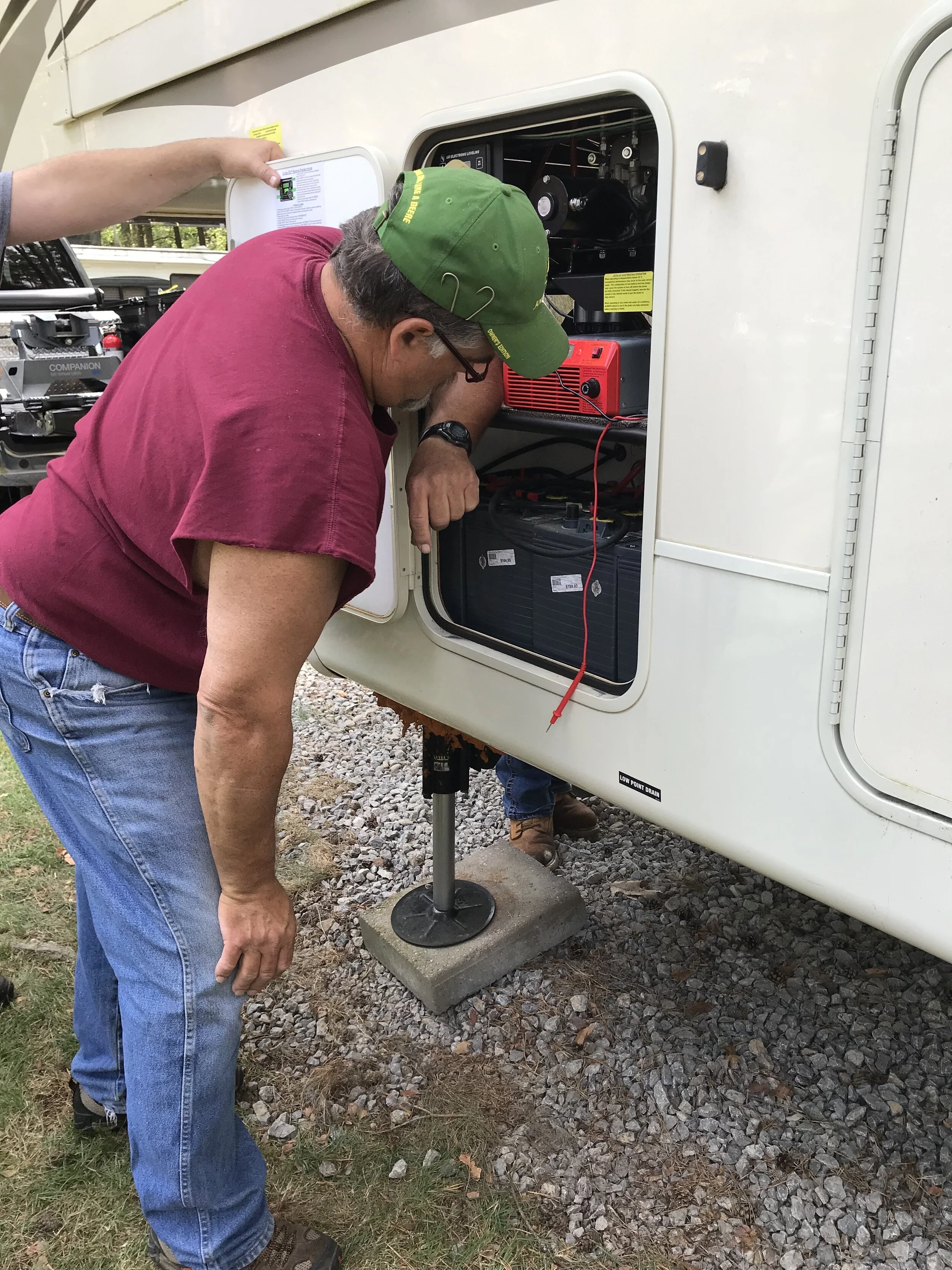 Our neighbor Bill helping to find a slide solution.