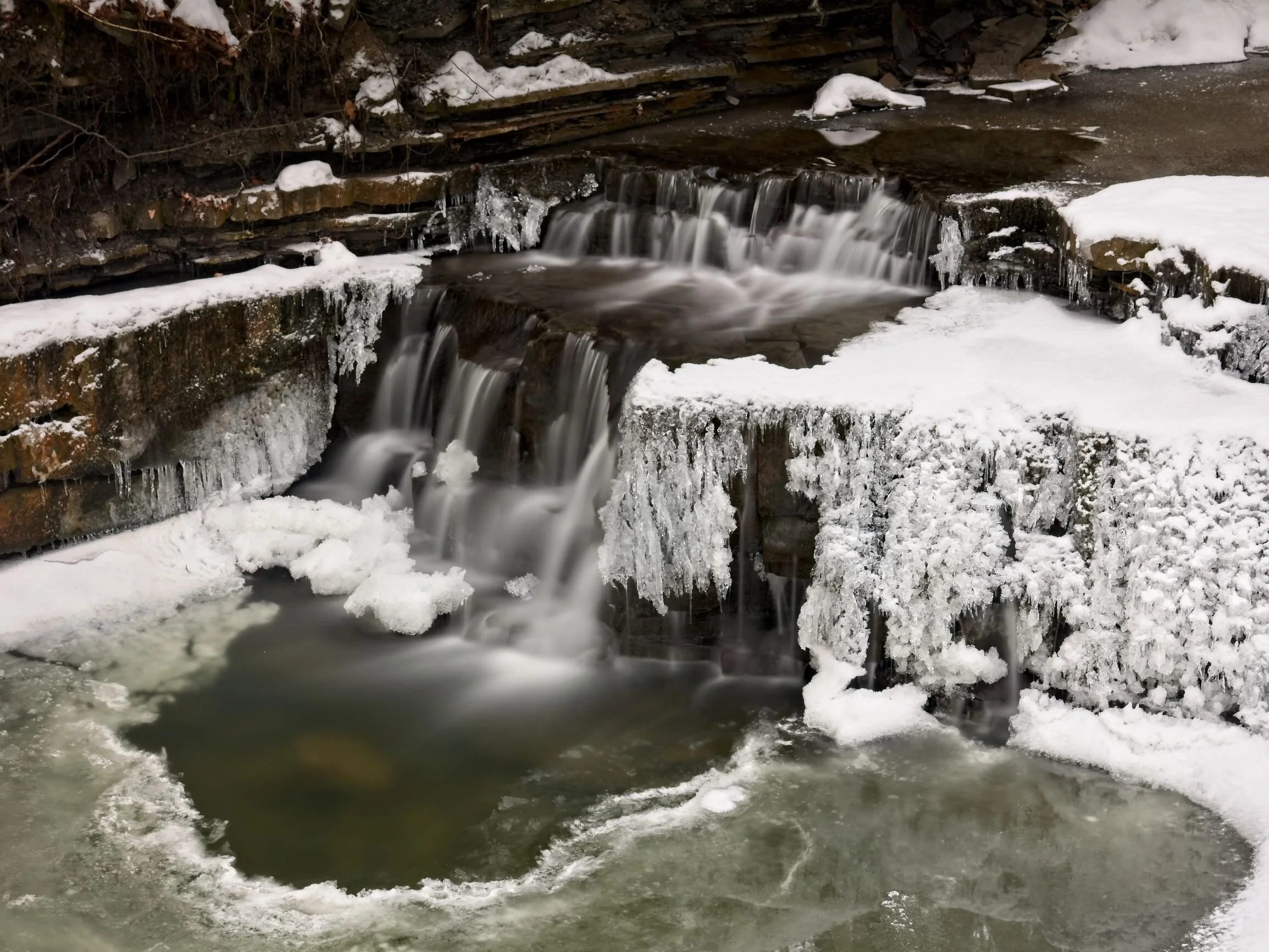 Multiple cascading waterfalls can be seen along the trail at Wolf Creek Falls Preserve. Pic by J Berringer