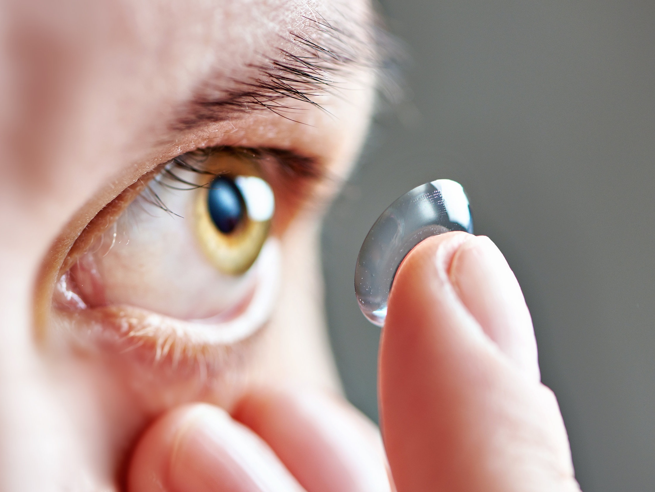 Medicine+and+vision+-+young+woman+with+contact+lens.jpg
