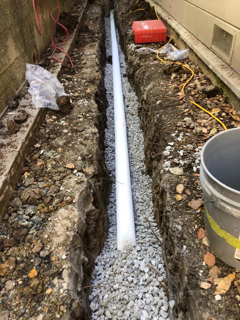 Drainage pipe system being installed. 
