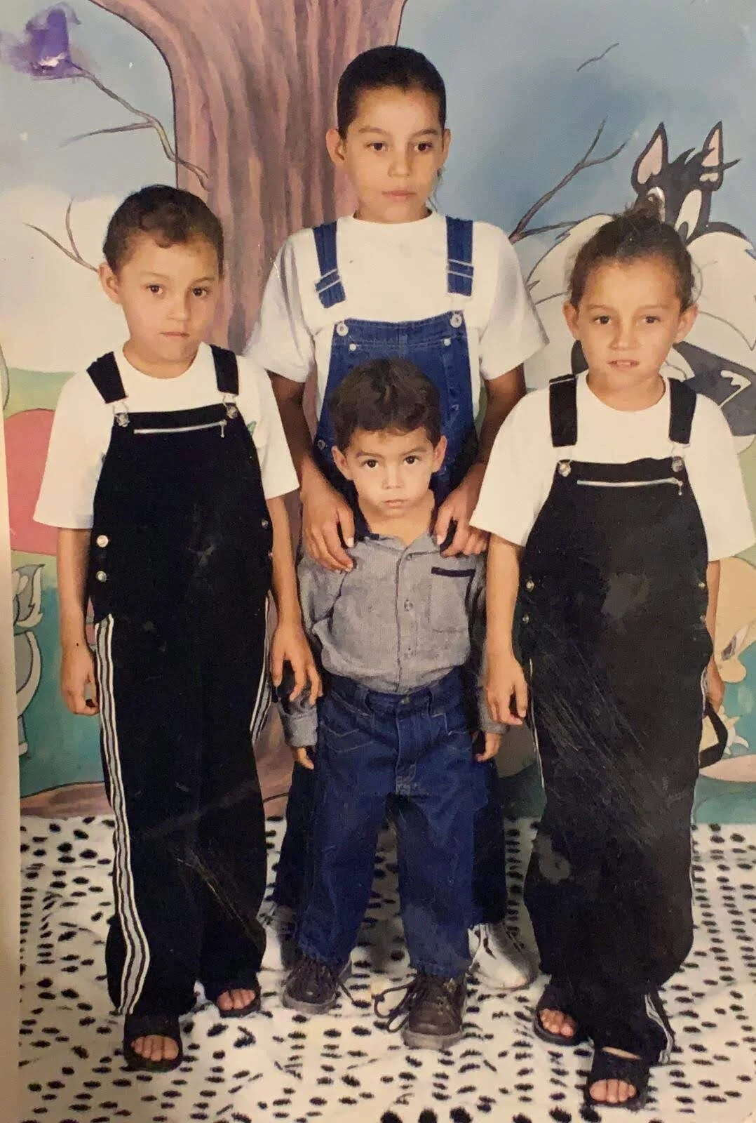 My sibling, oldest sister (center) twins (left and right) and I.