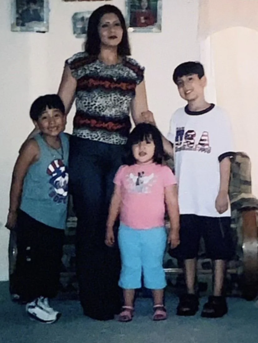 woman with three children