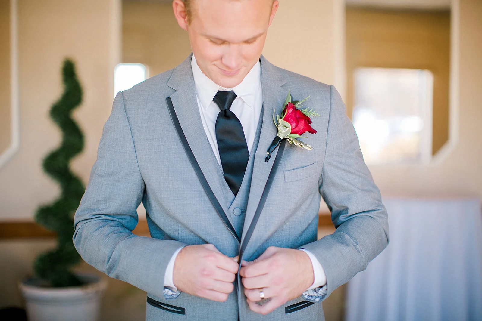 Photo by Rachel Graff Photography | wedding banquet hall at Royal Cliff south metro Minnesota | groom getting ready