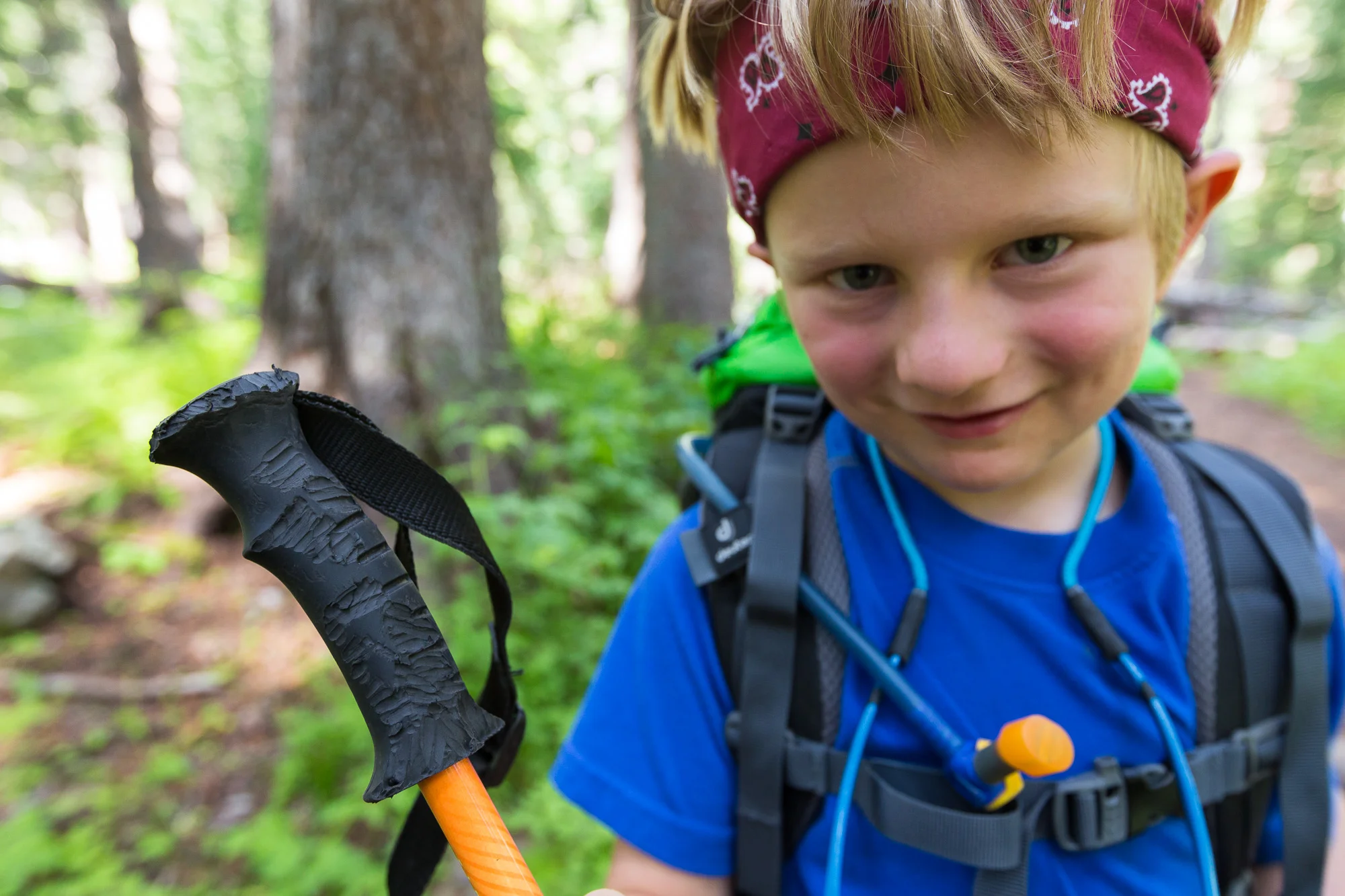 Young Hiker Holding Trekking Pole Chewed On by Marmots.jpg