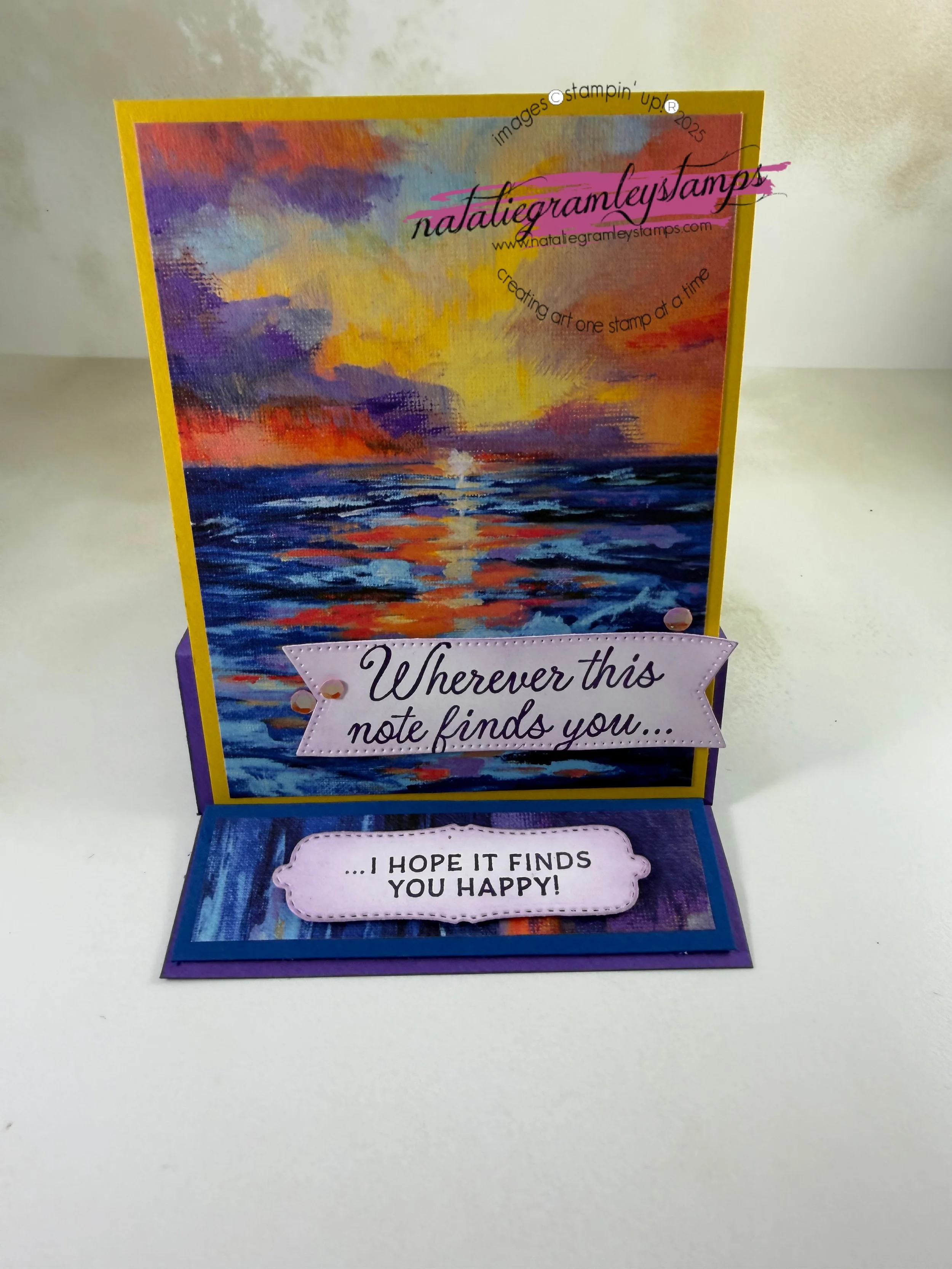 A greeting card with a sunset over the water that say Wherever this finds you and the inside that says I hope it finds you happy