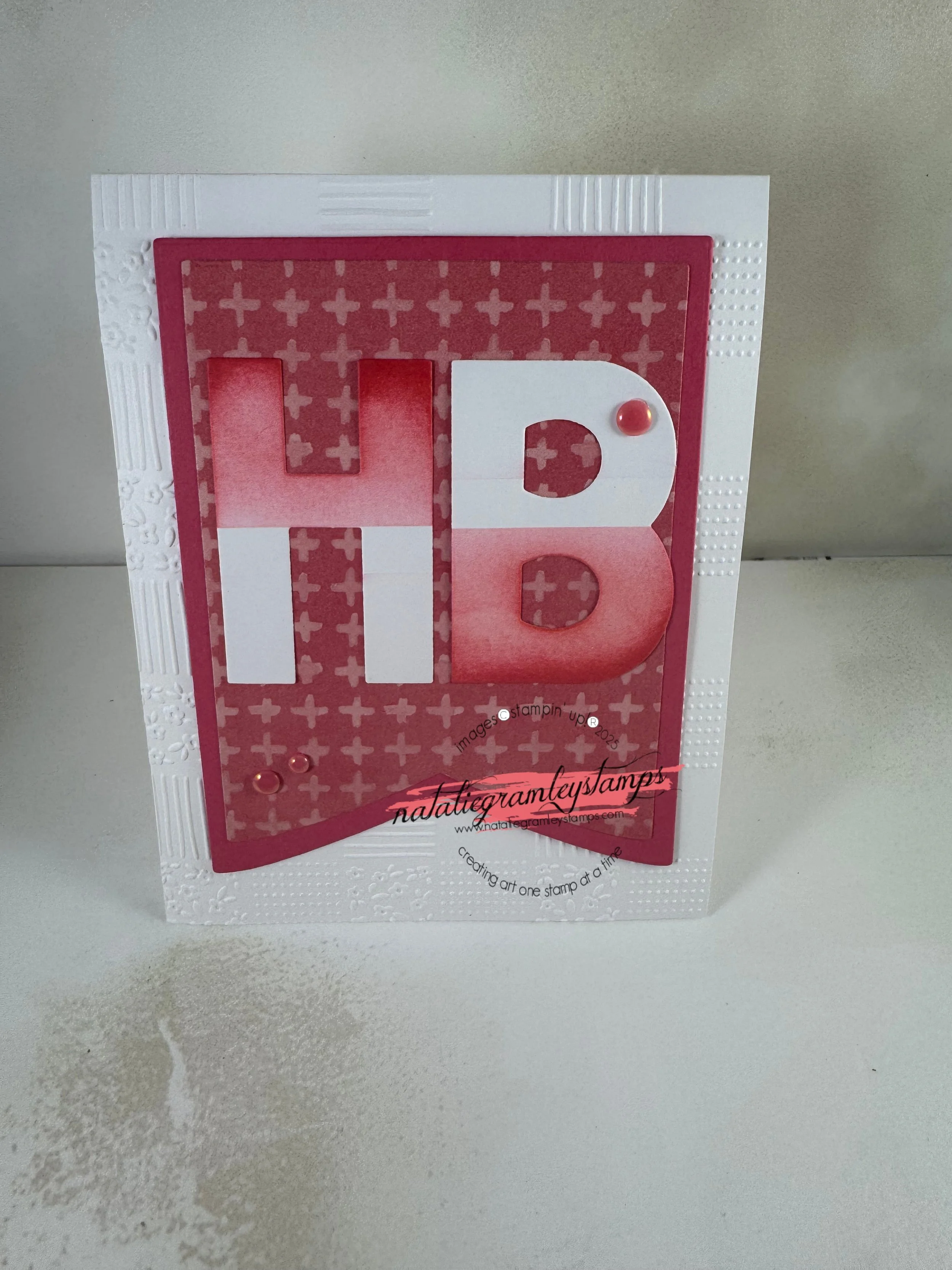 Red greeting card with HB on the cover