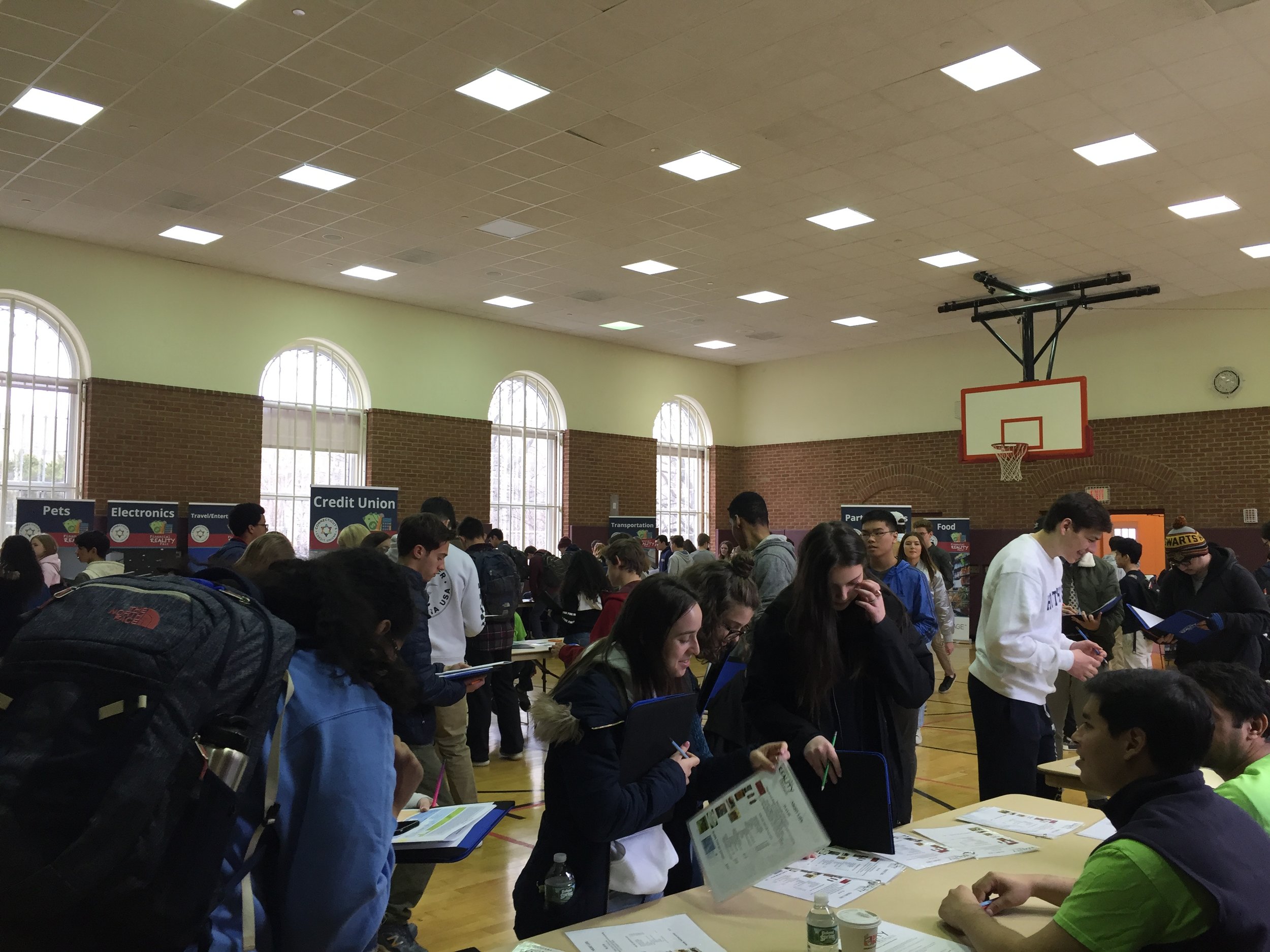 Volunteers and students at the fair