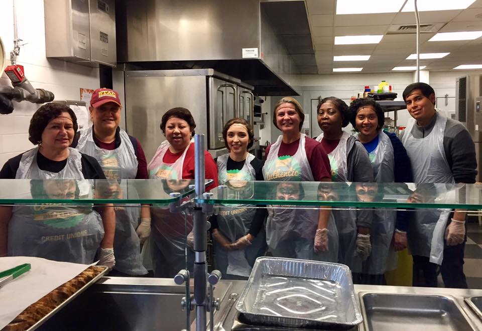 Volunteers preparing food