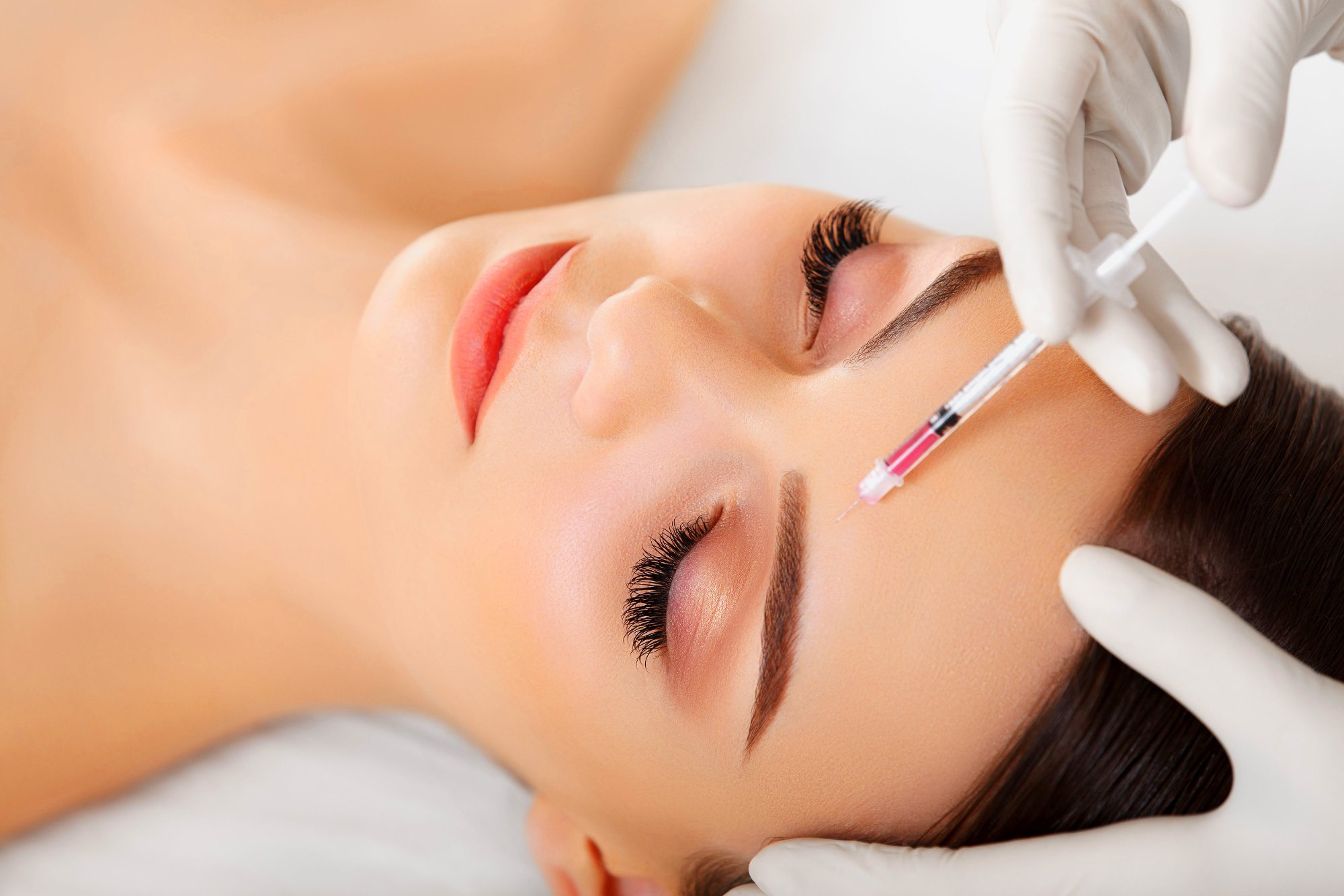123rf_woman_face_needle_2000px.jpg