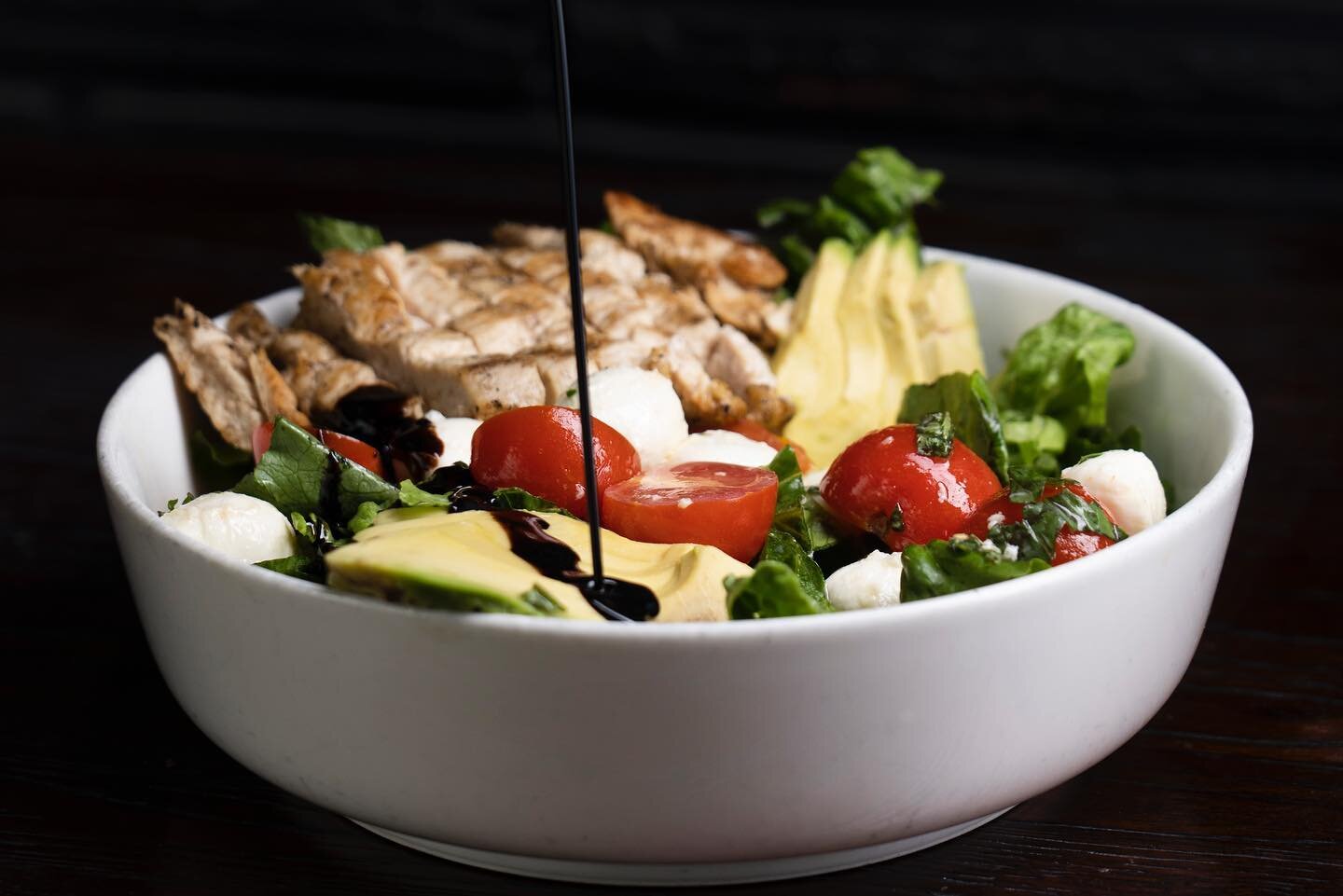 Have you tried our new Caprese Salad? Crisp lettuce, grilled chicken, fresh mozerella, cherry tomatoes, basil, and avocado drizzled in our homemade balsamic vinaigrette dressing. Today we are open from 4-9pm with indoor/outdoor dining and online orde