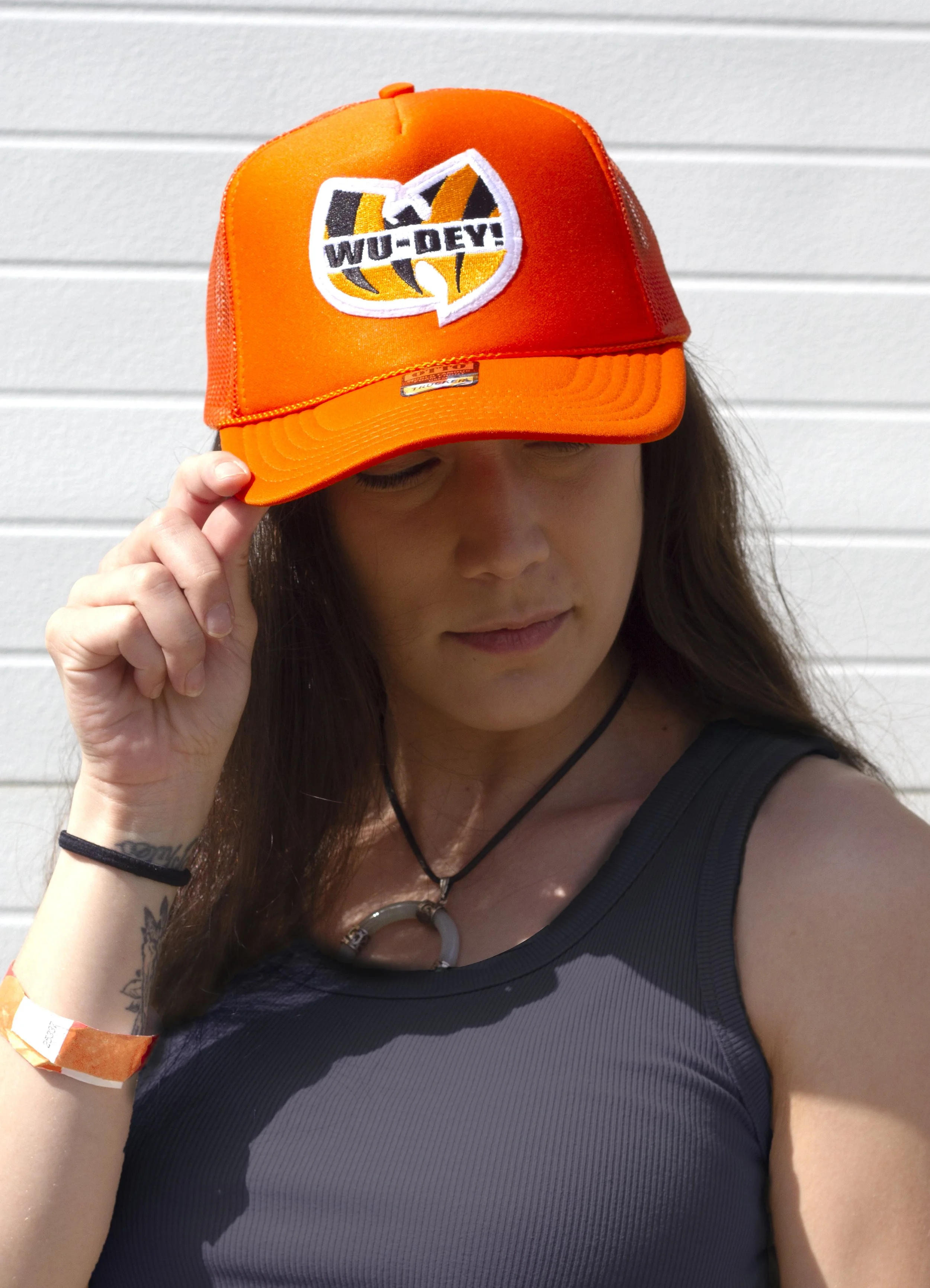 matteaOrangeTruckerHat.jpg