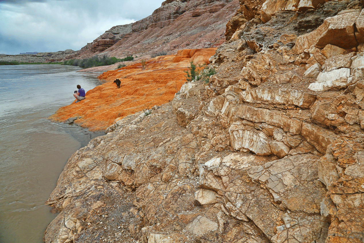 An older, innactive but natural travertine and barite mound, originally described by John Wesley Powell on his explorations in 1869: “W e stop to examine some interesting rocks, deposited by mineral springs that at one time must have existed here, but which are no longer flowing... “