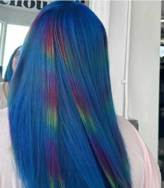 A splash of iridescence.
We are absolutely in love with his color by @ash.nashvillehairstylist 
Creative colors are hourly services book your complimentary consult today to have your own hair transformation
#thehideoutsalonandlounge #weirdiswelcome #