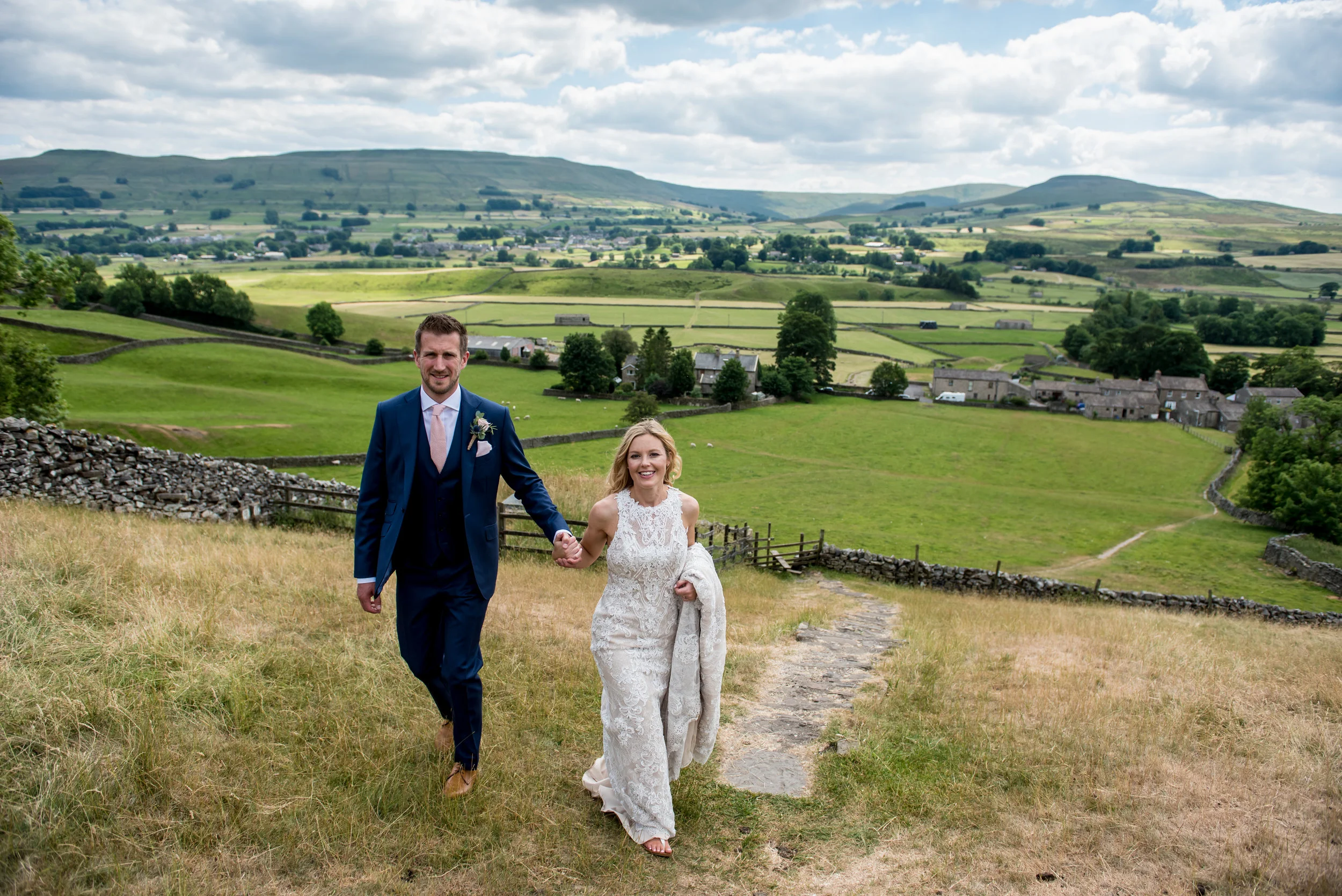 JMA-PHOTOGRAPHY-YORKSHIRE-WEDDING-COUPLE-WALKING-DALES.jpg