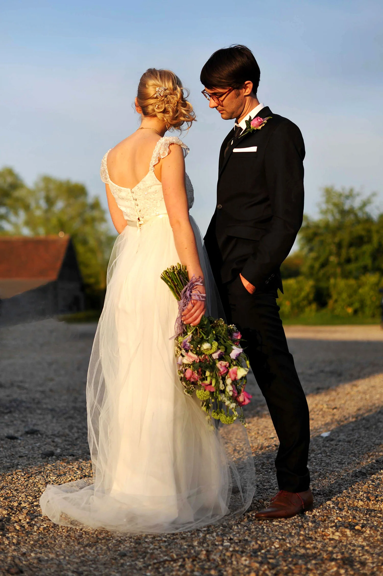 JMA-PHOTOGRAPHY-WEDDING-LEEDS-COUPLE-STANDING-IN-SUN.jpg