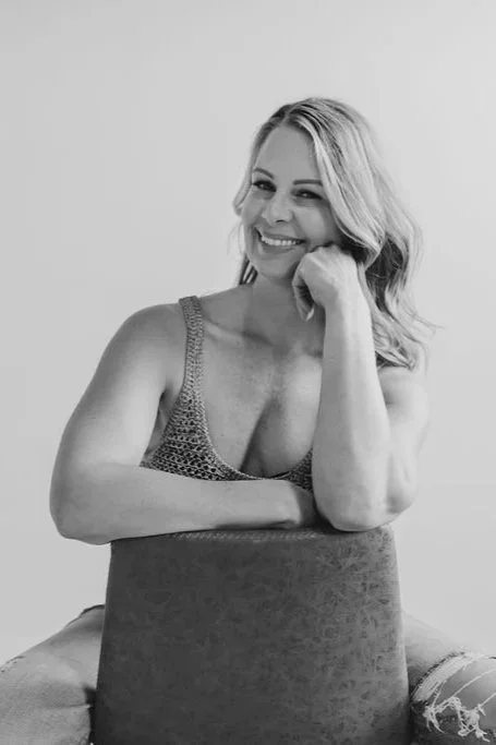 Angie Bloom providing holistic coaching to help clients achieve emotional freedom and personal growth.