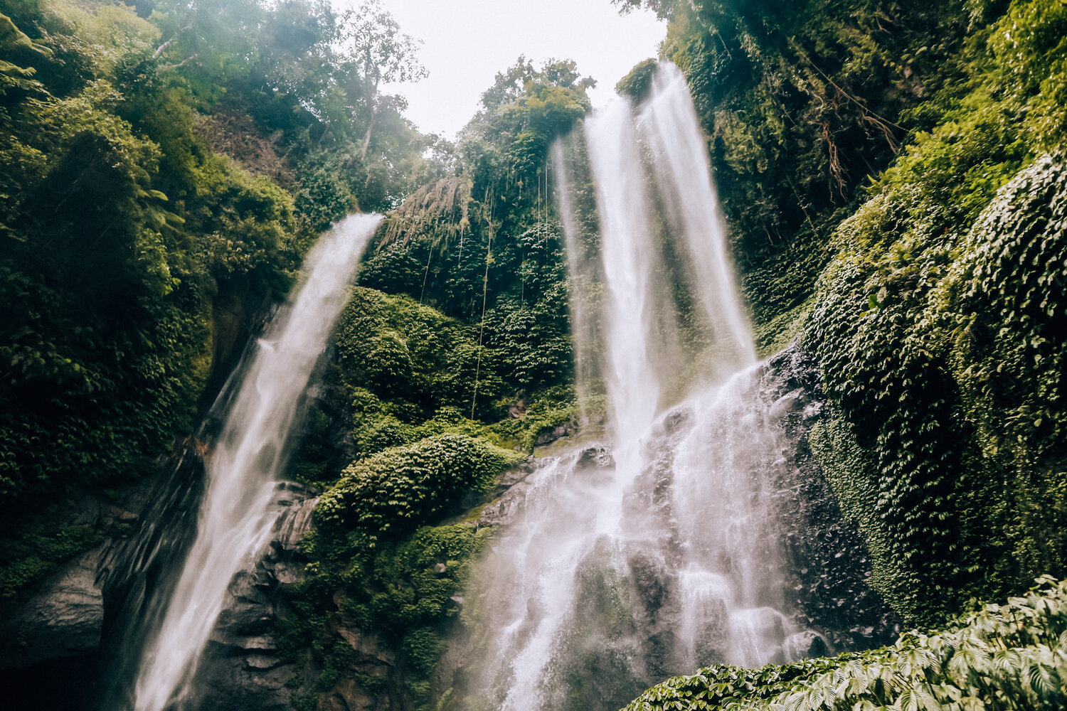 There are so many beautiful waterfalls all over Bali, many with amazing hikes through the jungle and beautiful blue waters. Sounds amazing right? These are the  waterfalls you can’t miss ! I’ve put together a list of the  top 4 waterfalls you must-see in Bali . You might even call these  the best waterfalls in Bali!  Add these to your Bali bucketlist and enjoy the adventure!