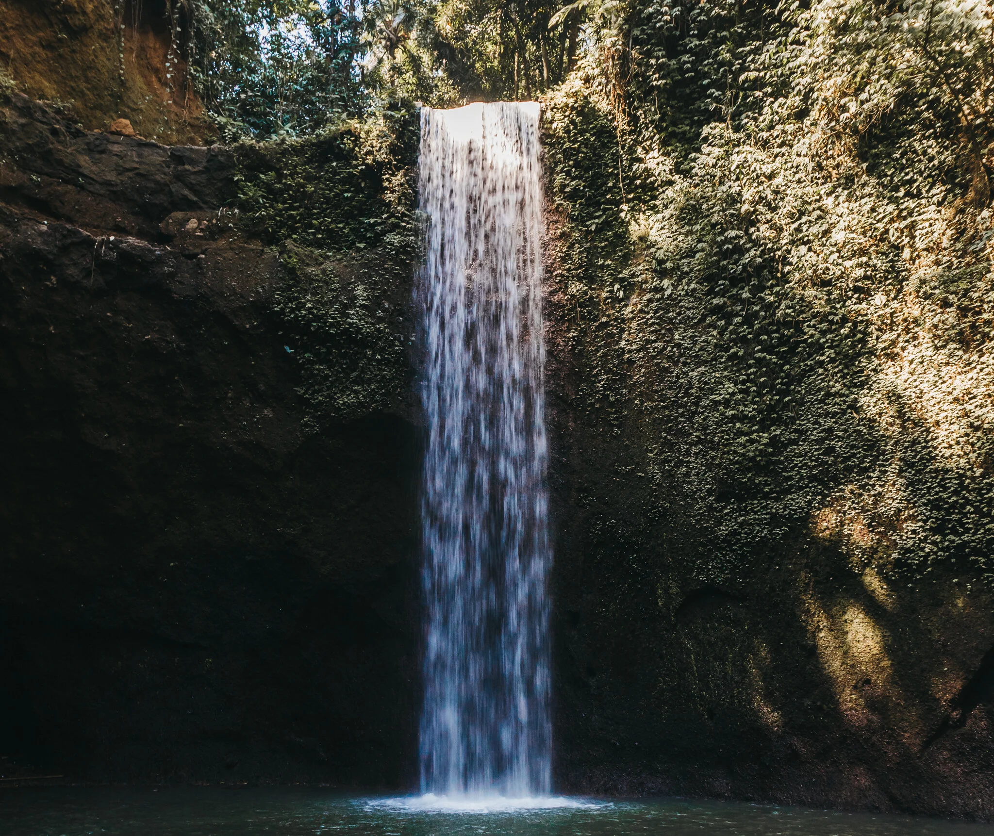 There are so many beautiful waterfalls all over Bali, many with amazing hikes through the jungle and beautiful blue waters. Sounds amazing right? These are the  waterfalls you can’t miss ! I’ve put together a list of the  top 4 waterfalls you must-see in Bali . You might even call these  the best waterfalls in Bali!  Add these to your Bali bucketlist and enjoy the adventure!