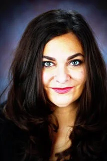 Here she is pictured tarted up like a Las Vegas realtor.