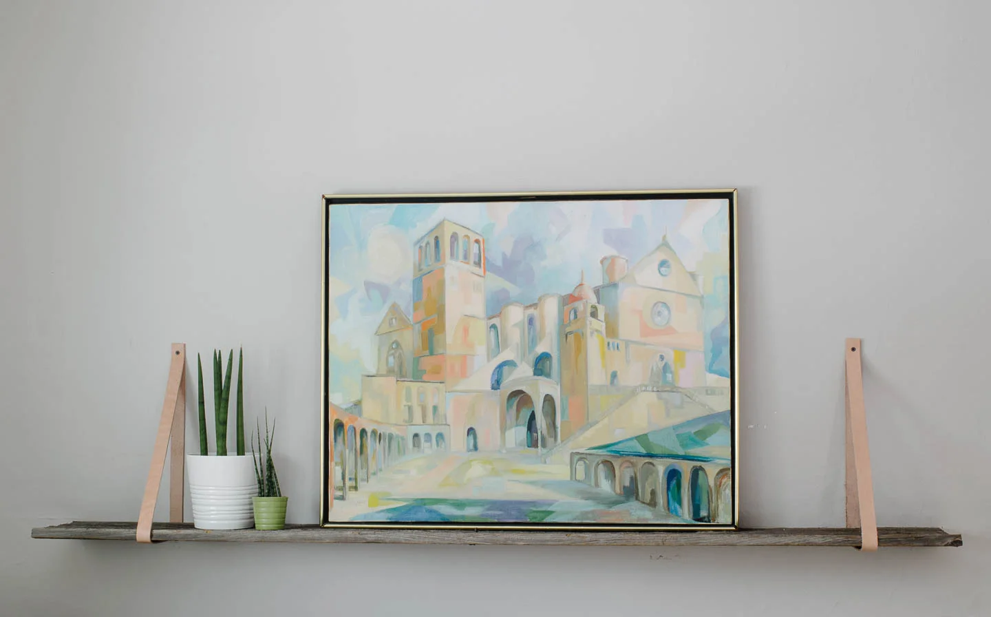 Simple DIY shelf with reclaimed wood and leather straps