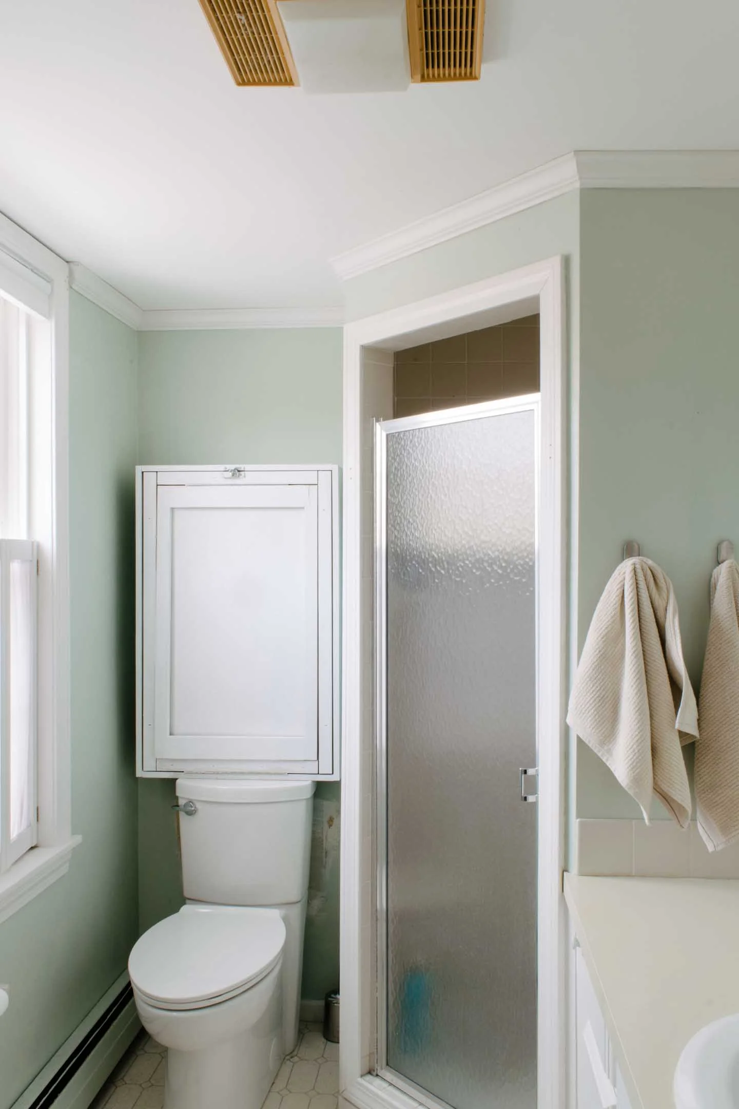 A Fold-Away Changing Table for the Bathroom