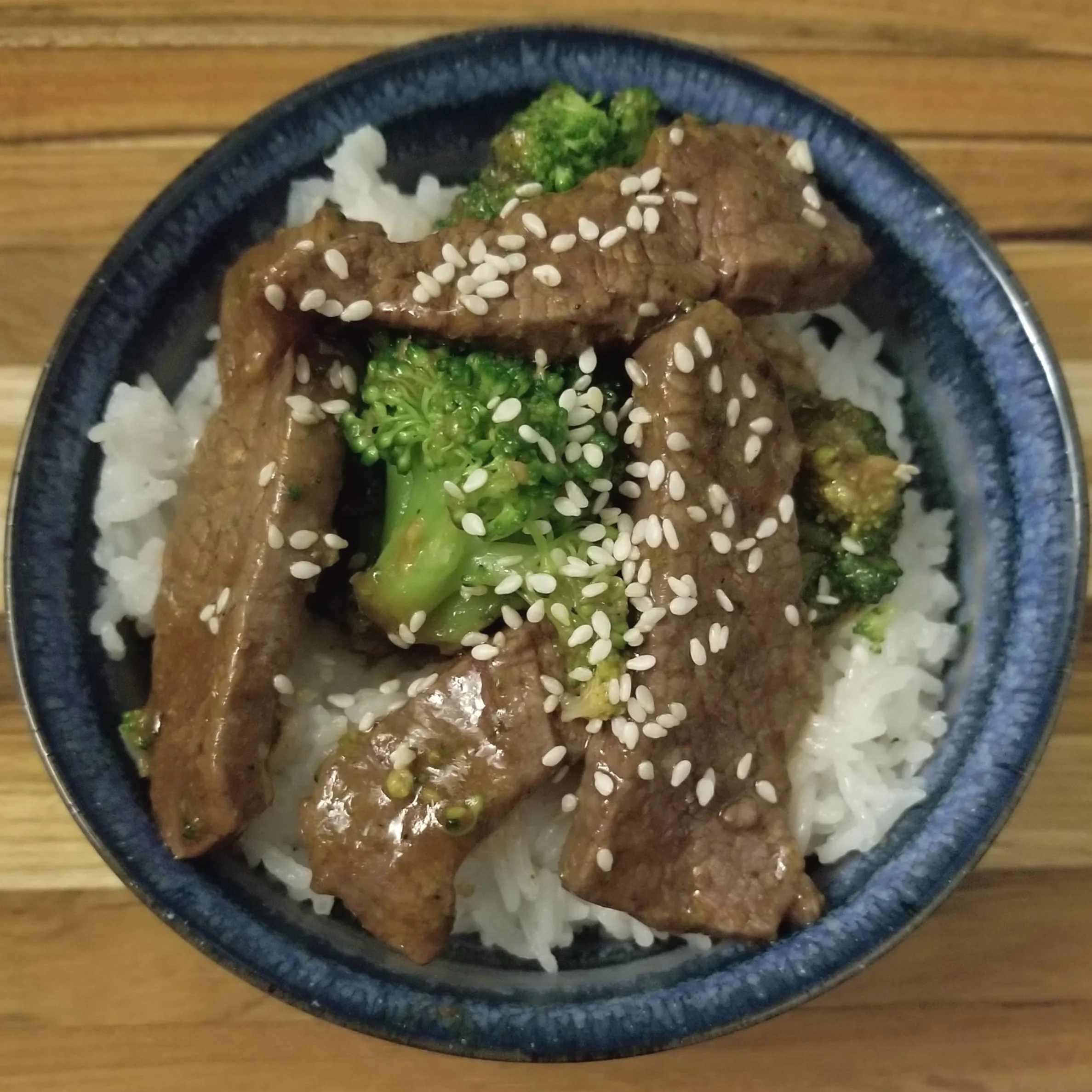 Better-than-takeout beef & broccoli served with steamed rice (gluten-free)