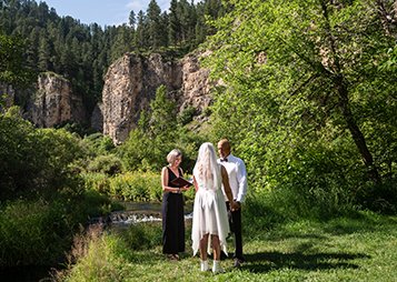 Wedding vows alongside the creek above Roughlock Falls