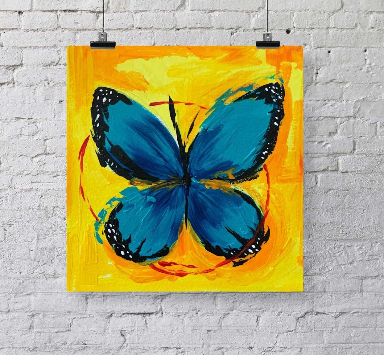 art print blue butterfly on yellow background gallery brick wall