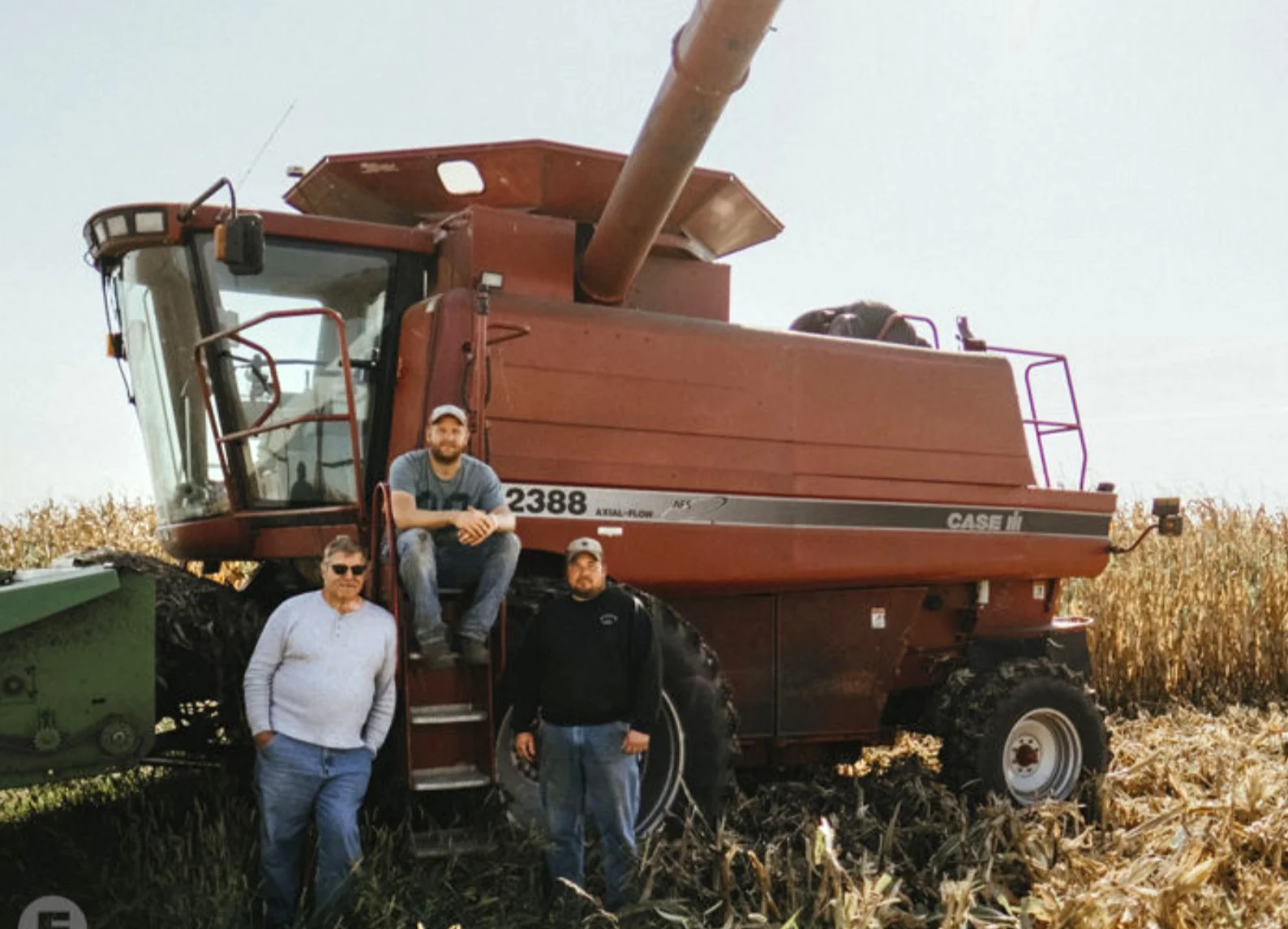 Harold Wilken, his son Ross, and his nephew Tim Vaske take a short break from the 2018 corn harvest. Photo by Judd Demaline/Feast Magazine.