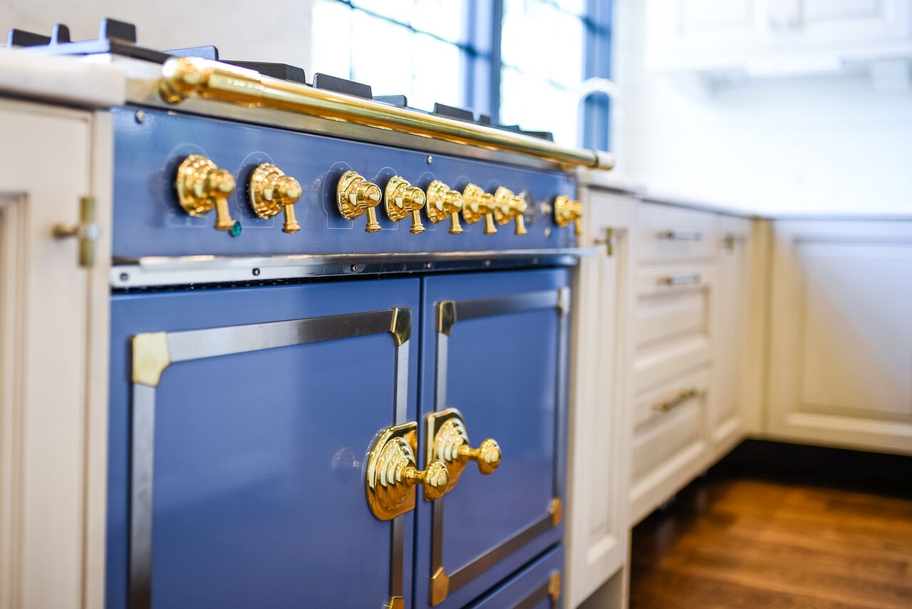 Striking 43” LaCornue® French range in Provence blue finish with brass knobs