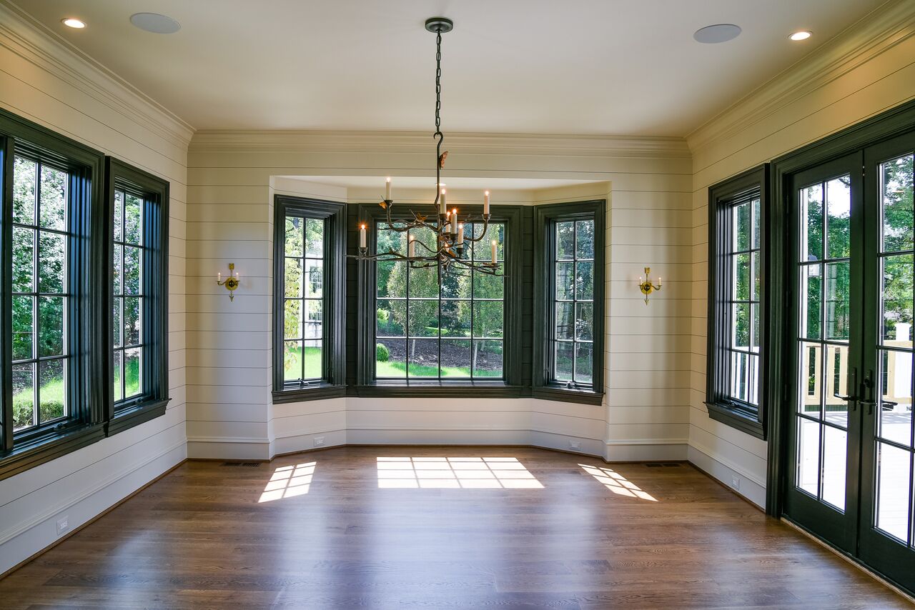 Custom trim work including ship-lap in the sunroom of the Rutledge model