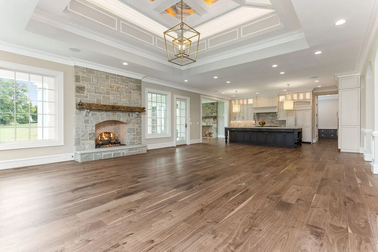 Reclaimed 7" plank walnut flooring by Reclaimed Designworks of Charleston