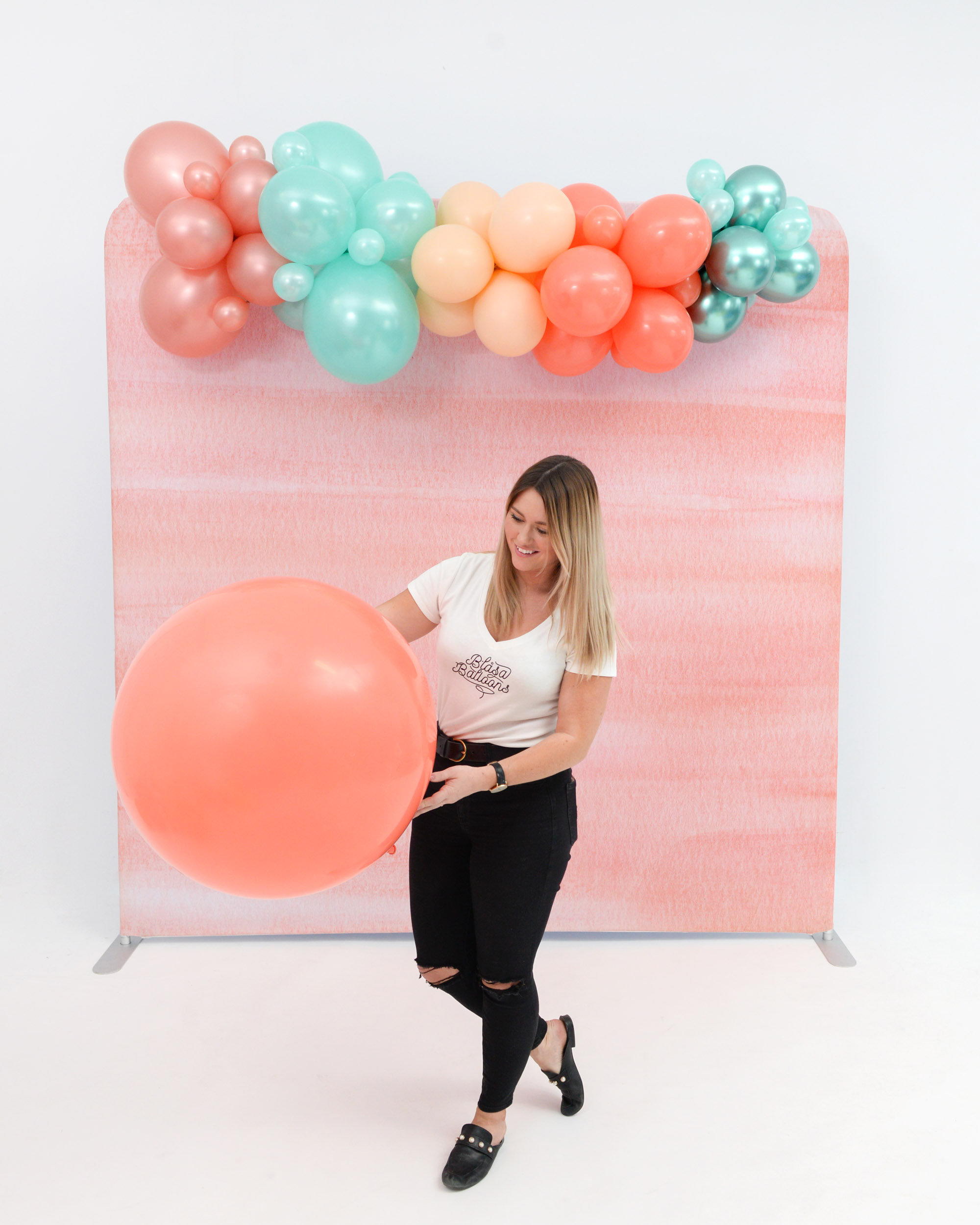 Girl with Coral Jumbo Balloon