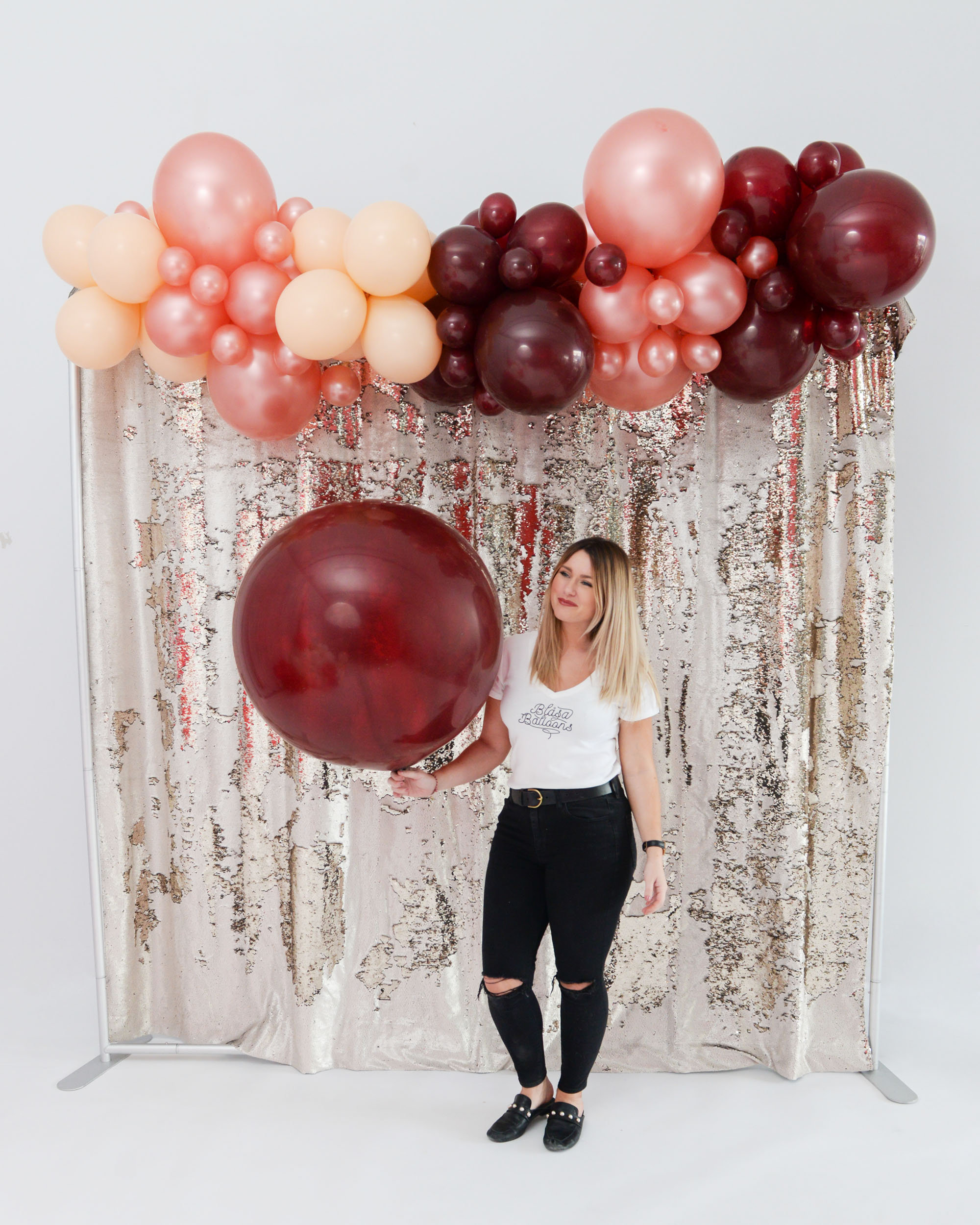 Girl with Burgundy Jumbo Balloon