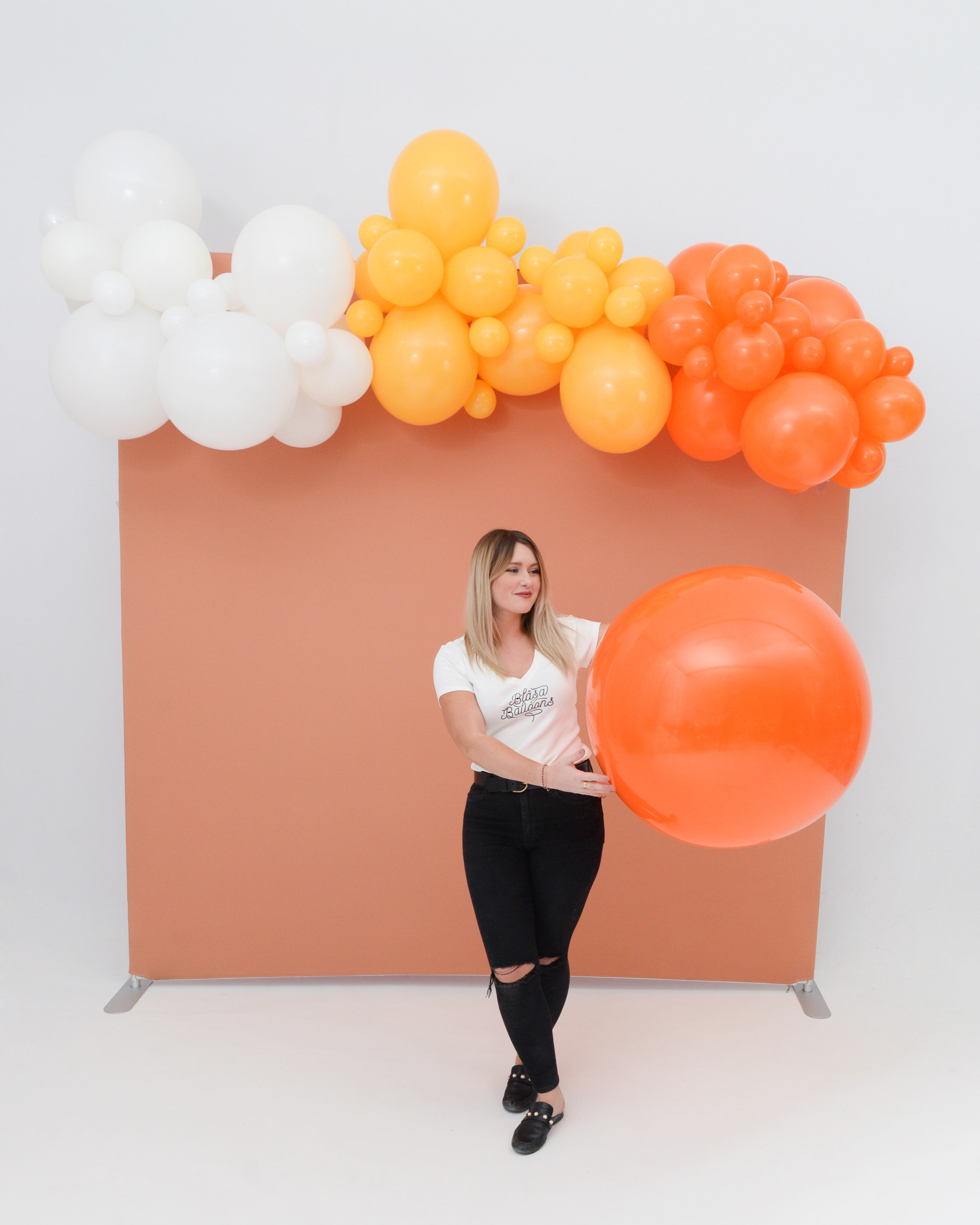 Girl With Orange Jumbo Balloon