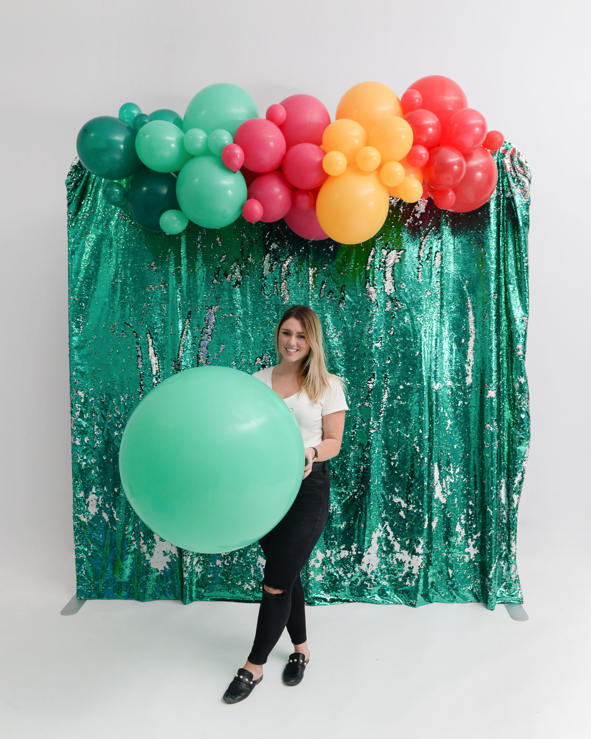 Girl With Green Jumbo Balloon