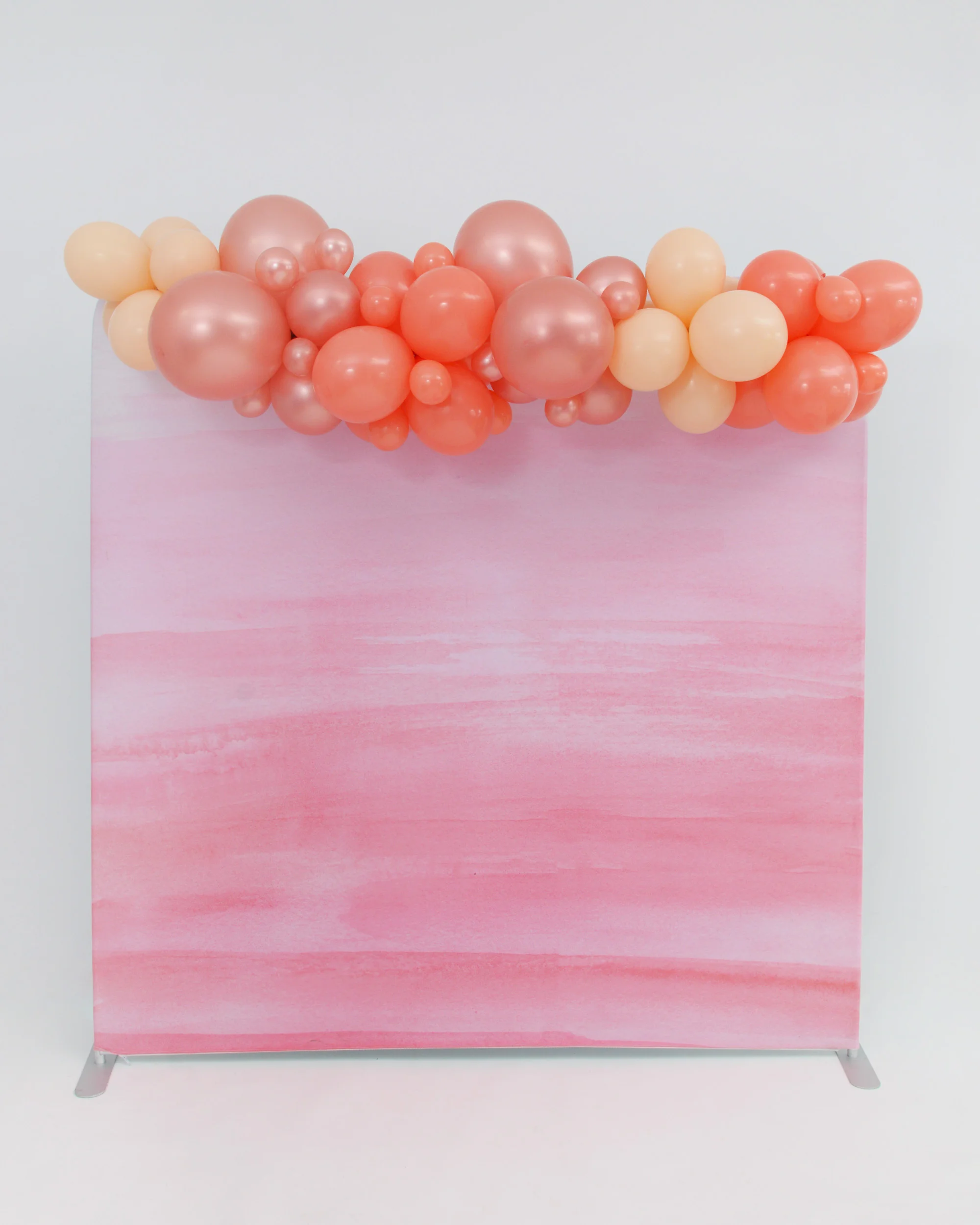 Peaches and Cream Balloon Garland on Pink Backdrop