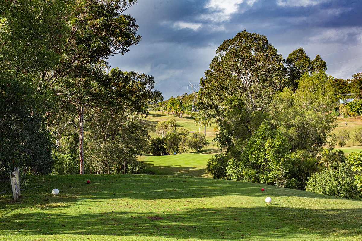 A challenging opening hole with a narrow entrance and two-tiered undulating green