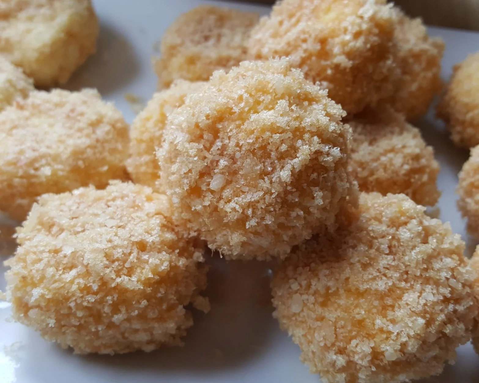 Coated cheese medallions.