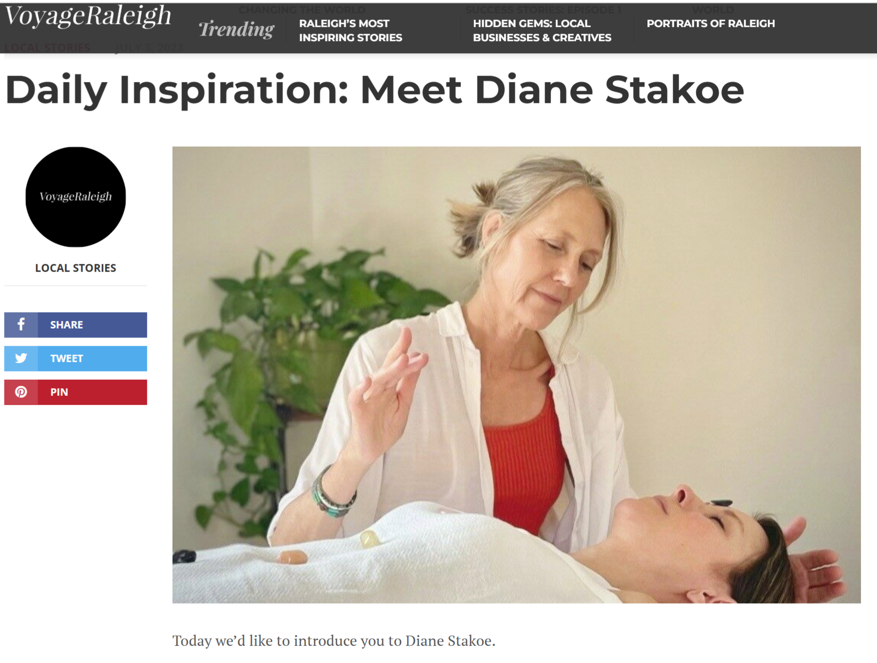 Reiki master channeling energy over a client lying face up.