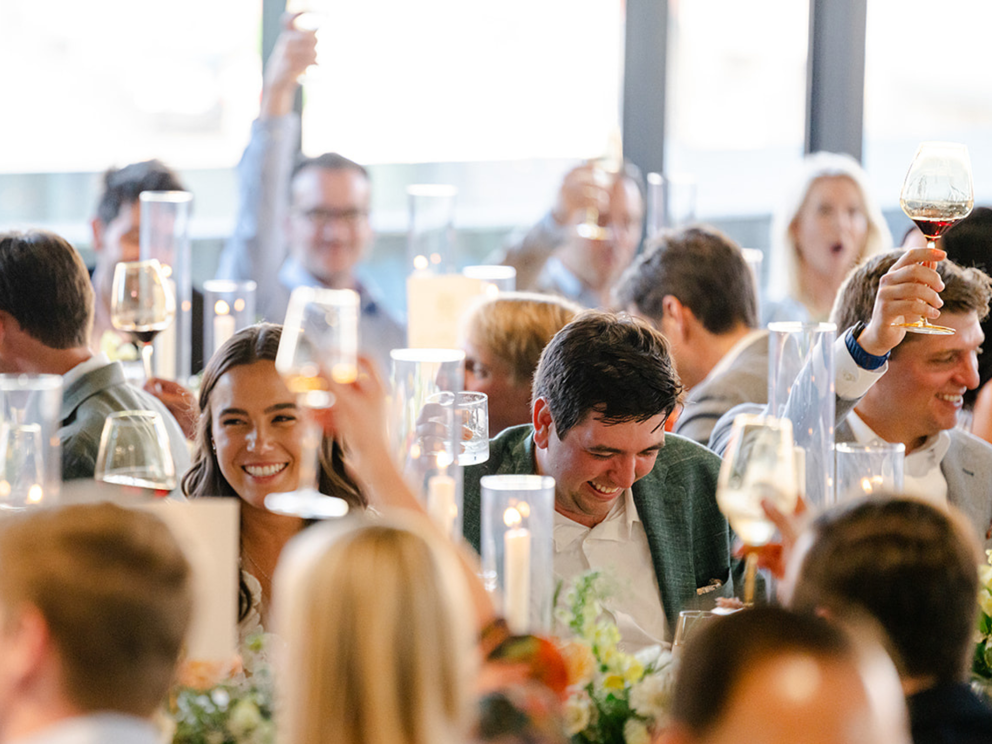 Wedding toast at Park City Utah wedding rehearsal dinner at Kimball Terrace