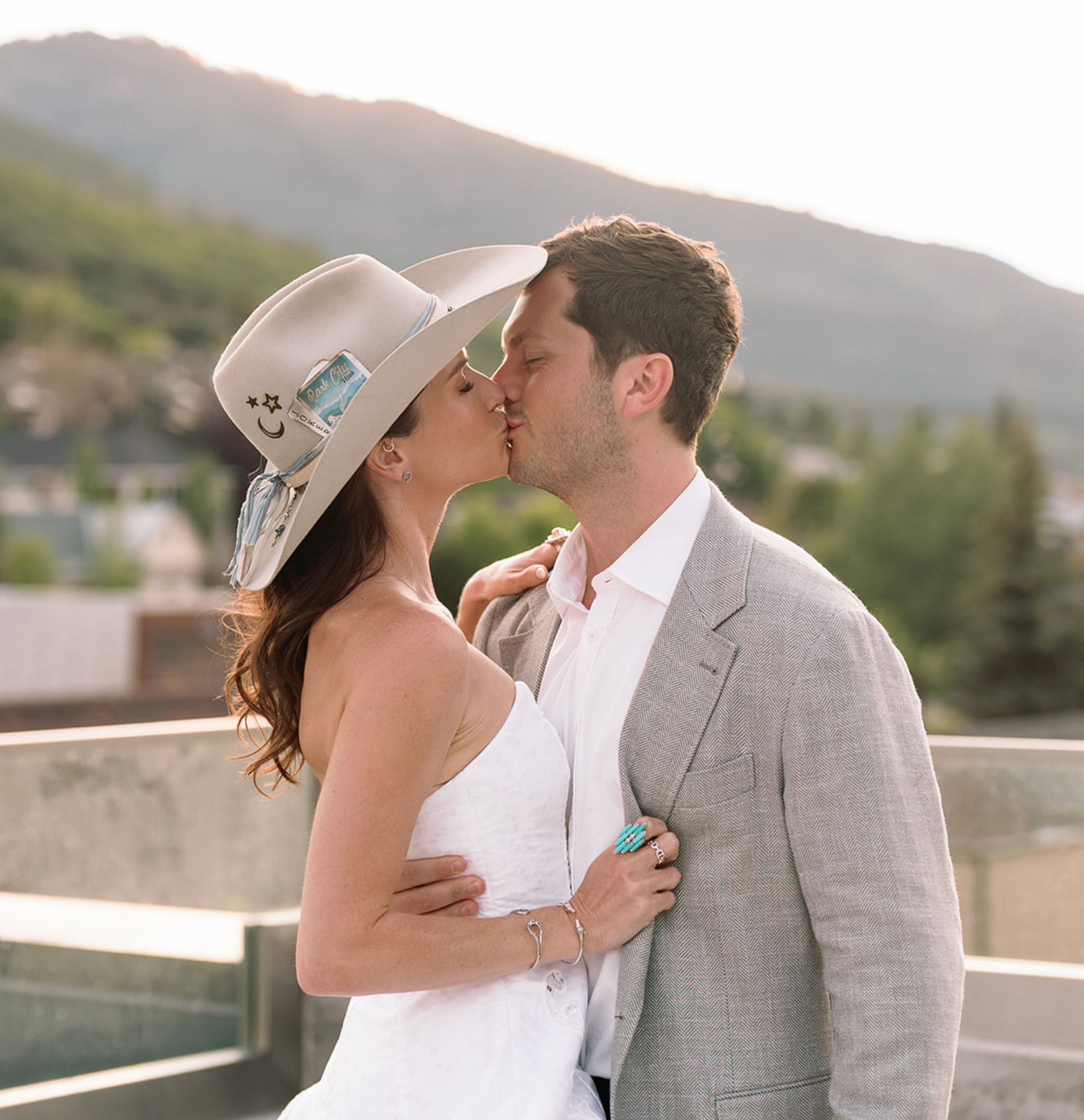 cowboy couple kissing in Park City