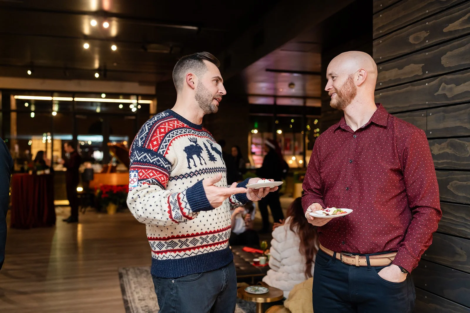 Guests chat at holiday company party
