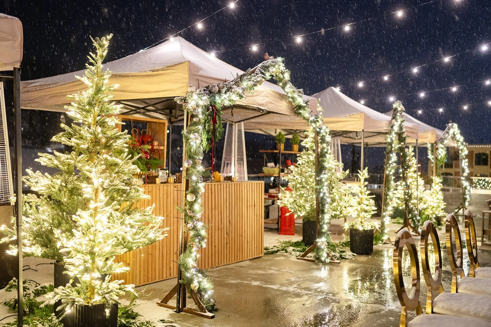 Park City snow, falling snow, Kimball Terrace holiday party, vendor booths, bistro lighting