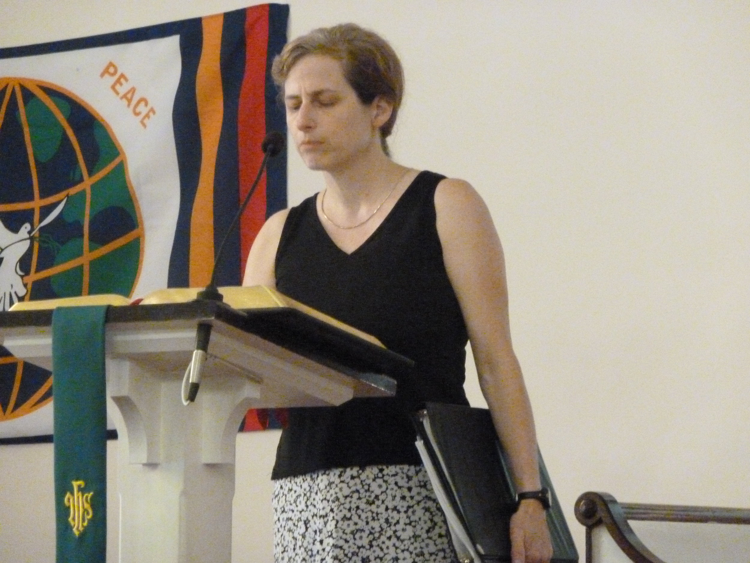 Sue doing a laity reading during worship.JPG