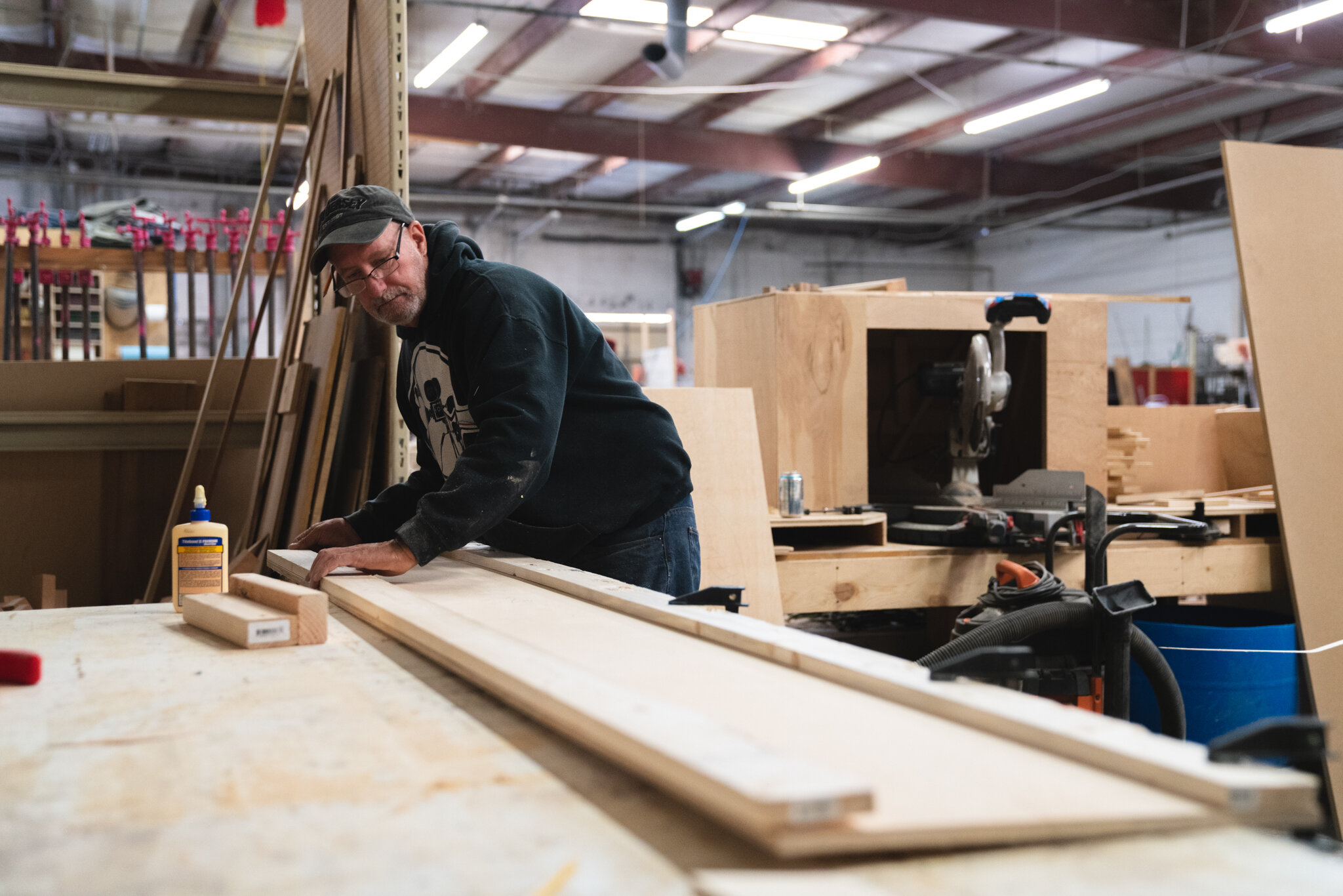  Make Nashville member uses a woodworking space in the shop to complete a project. 