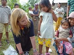 Dr. Suzanne Levine helping a young girl to find the right size.