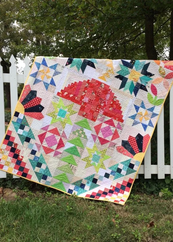 fresh and scrappy bom hanging on white picket fence.jpg