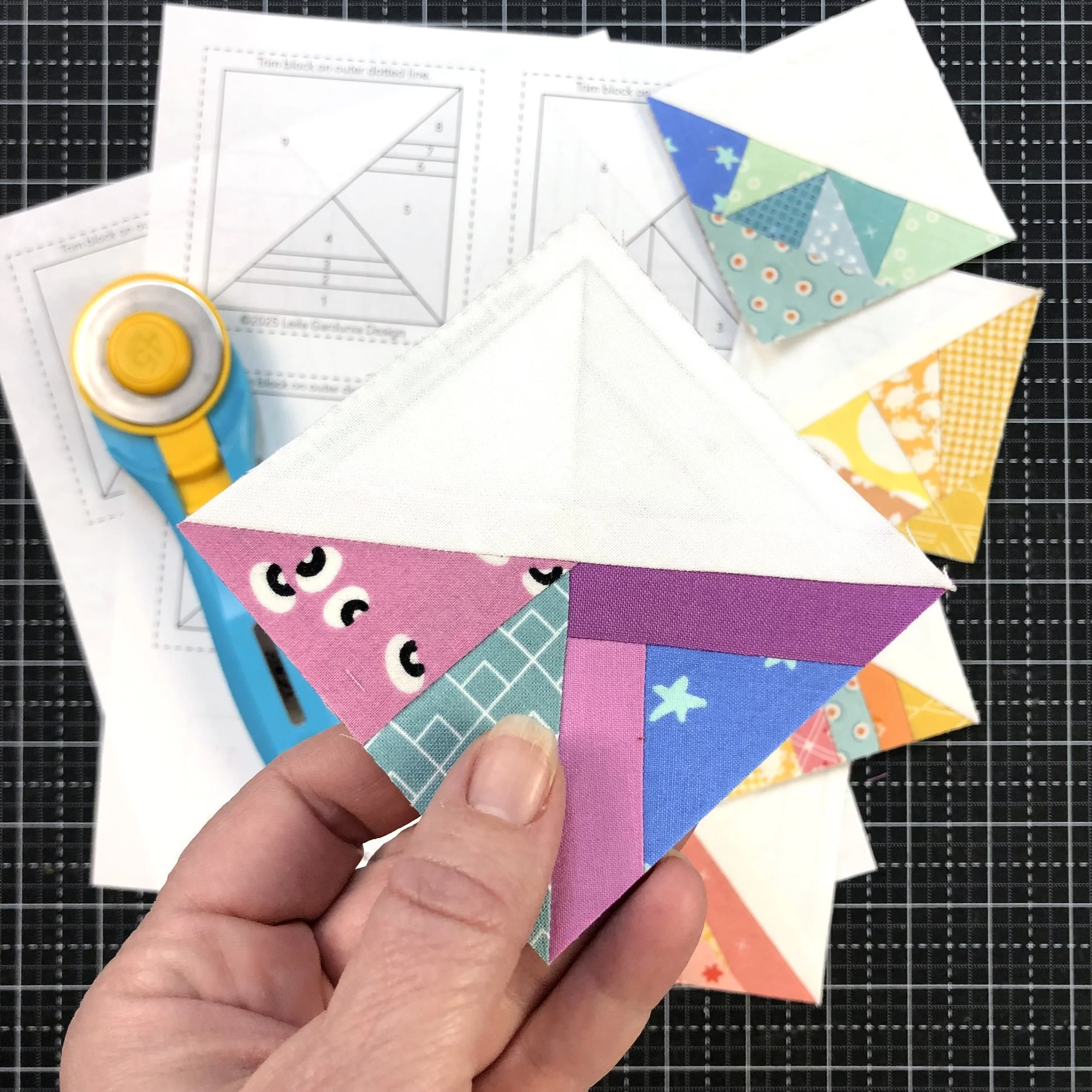 3" Scrappy Triangle quilt blocks close up.jpeg