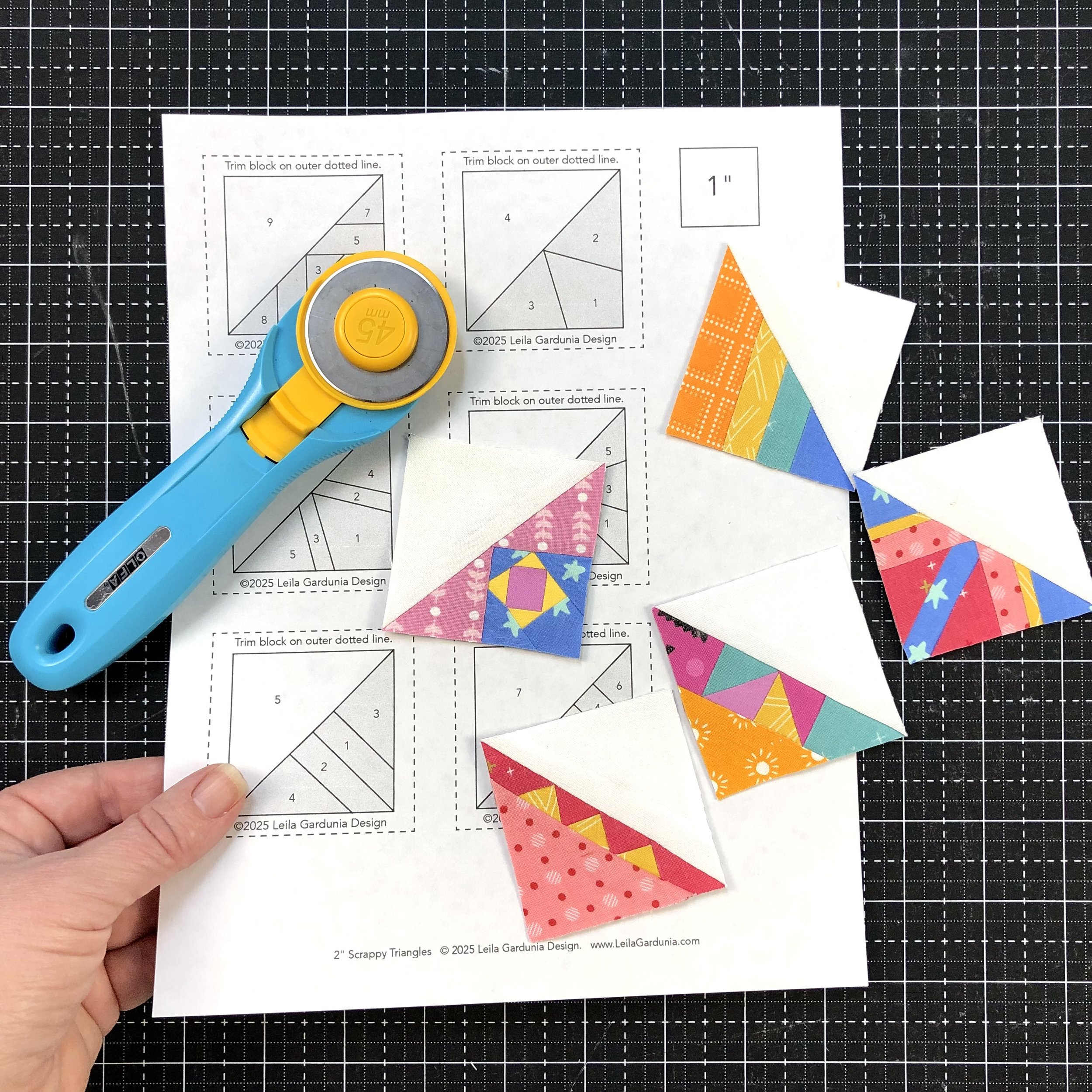 2 inch scrappy triangle quilt blocks and foundation.jpeg